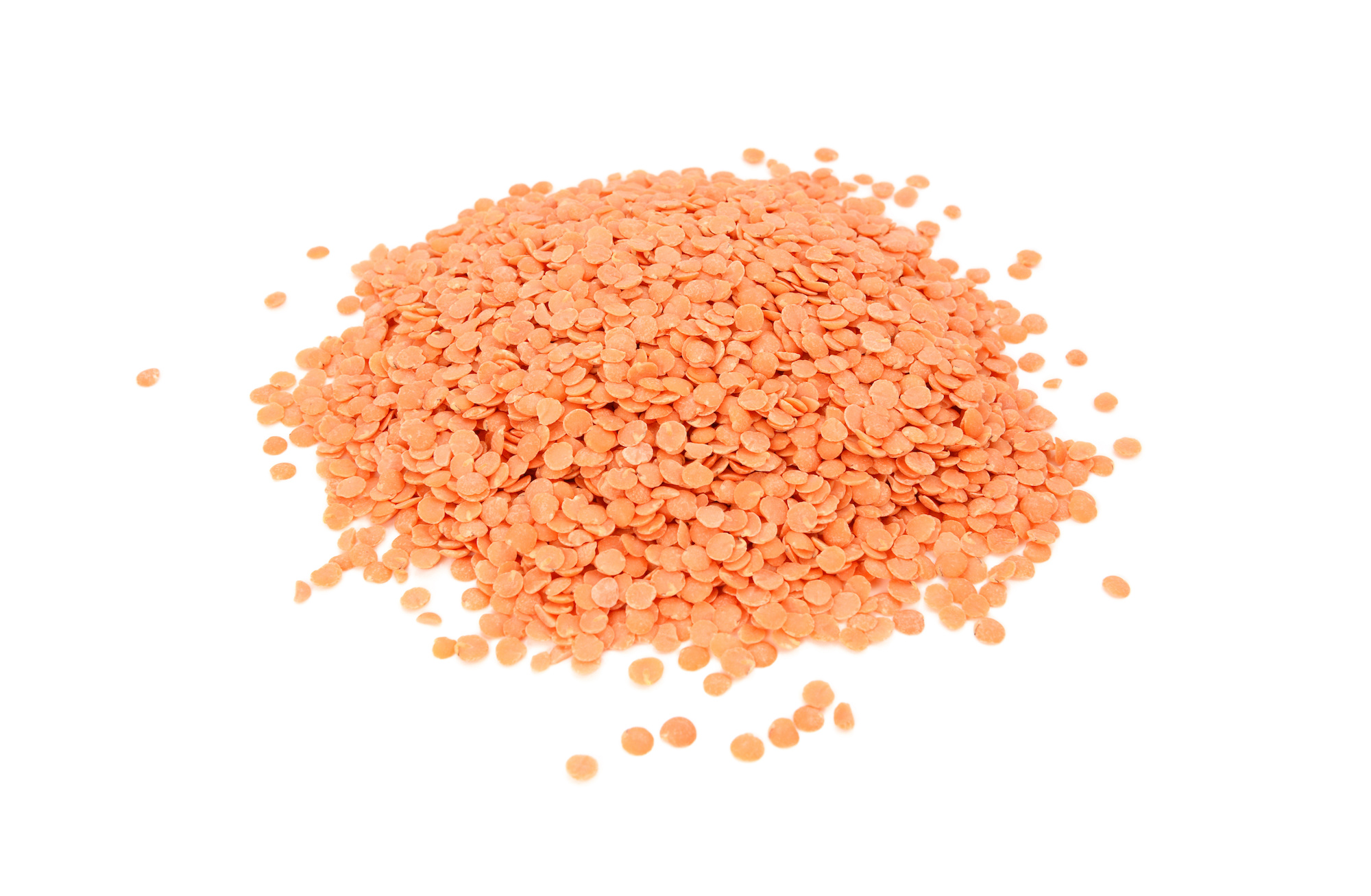 Red lentils, isolated on a white background